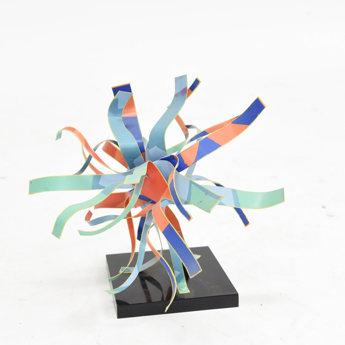 DOROTHY GILLESPIE SCULPTURE: Signed and numbered 37/99 Dimensions: H 7.5" x W 8" Condition: Very small losses to paint.