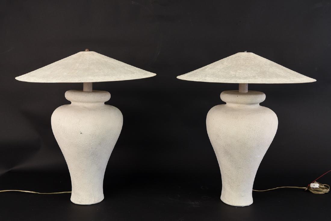 PAIR OF MIAMI STYLE LAMPS: Cermic base with metal shades. Dimensions: H 24.5" x D 22" Condition: Not tested. One lamp missing a finial. 1.5" x 1.25" chip to one lamps base edge. Couple light scratches. One plastic light fixture
