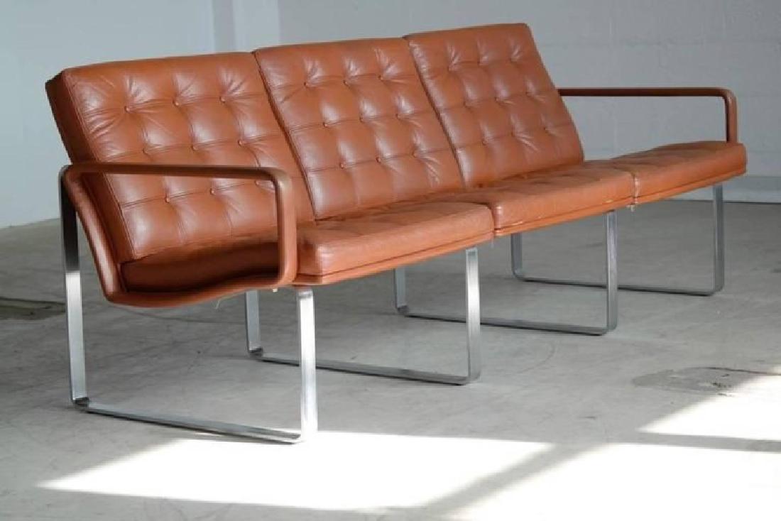 MODULINE LEATHER SOFA GJERLOV KNUDSEN FRANCE & SON: Original red/brown leather, steel legs. Designed by Ole GjerlÃ¸v-Knudsen and Torben Lind as part of the Moduline series in 1961 and manufactured by France & Son. Can be arranged as shown or as two s