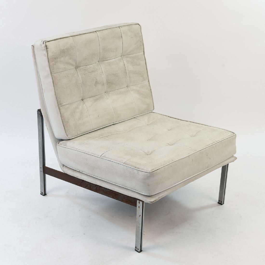 FLORENCE KNOLL PARALLEL BAR CHAIR: Dimensions: H 31" x W 25" x D 29" Condition: Some light creasing and soiling to upholstery. Some moderate to heavy wear to upholstery. Some cracks to piping. Some areas of rust to base.