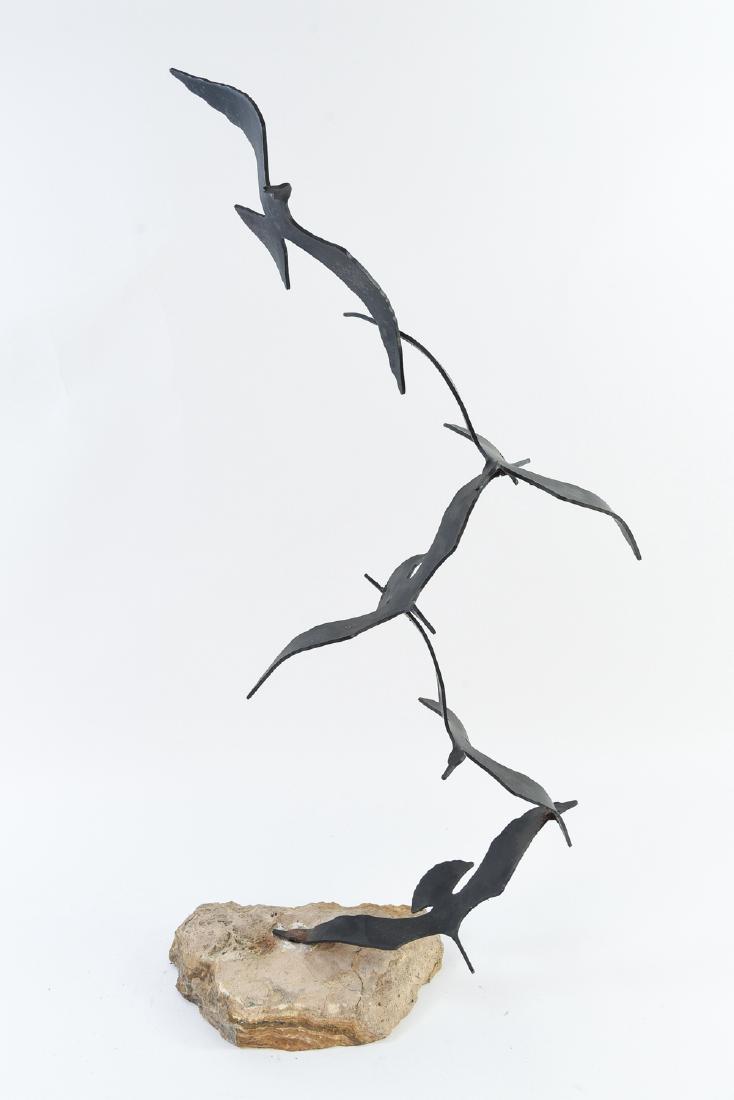 JERE BIRDS IN FLIGHT SCULPTURE: Brass mounted on stone base. Dimensions: H 31.5" x W 15" x D 6" Condition: Rust.