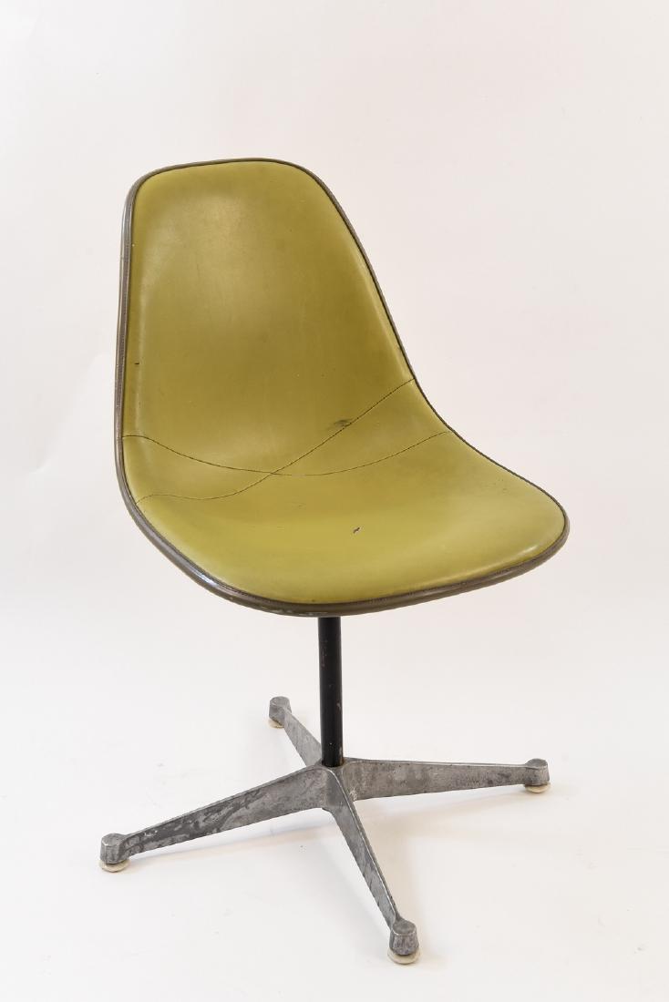 HERMAN MILLER FIBERGLASS SHELL CHAIR: Marked underneath Dimensions: H 32" x W 18.5" x D 19" Condition: Rip to seat upholstery; marks and wear to legs.
