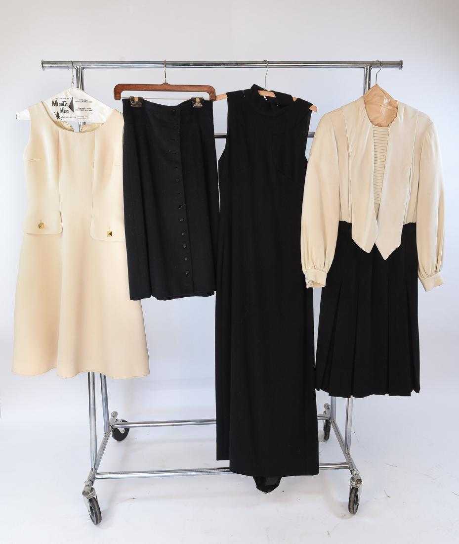 VINTAGE DRESSES AND SKIRT: Including button front Saint Laurent will black skirt size 44, Bonwitt teller full length dress no size, Unlabeled cream colored dress, Donald brooks black and white. Condition: showing signs of age,