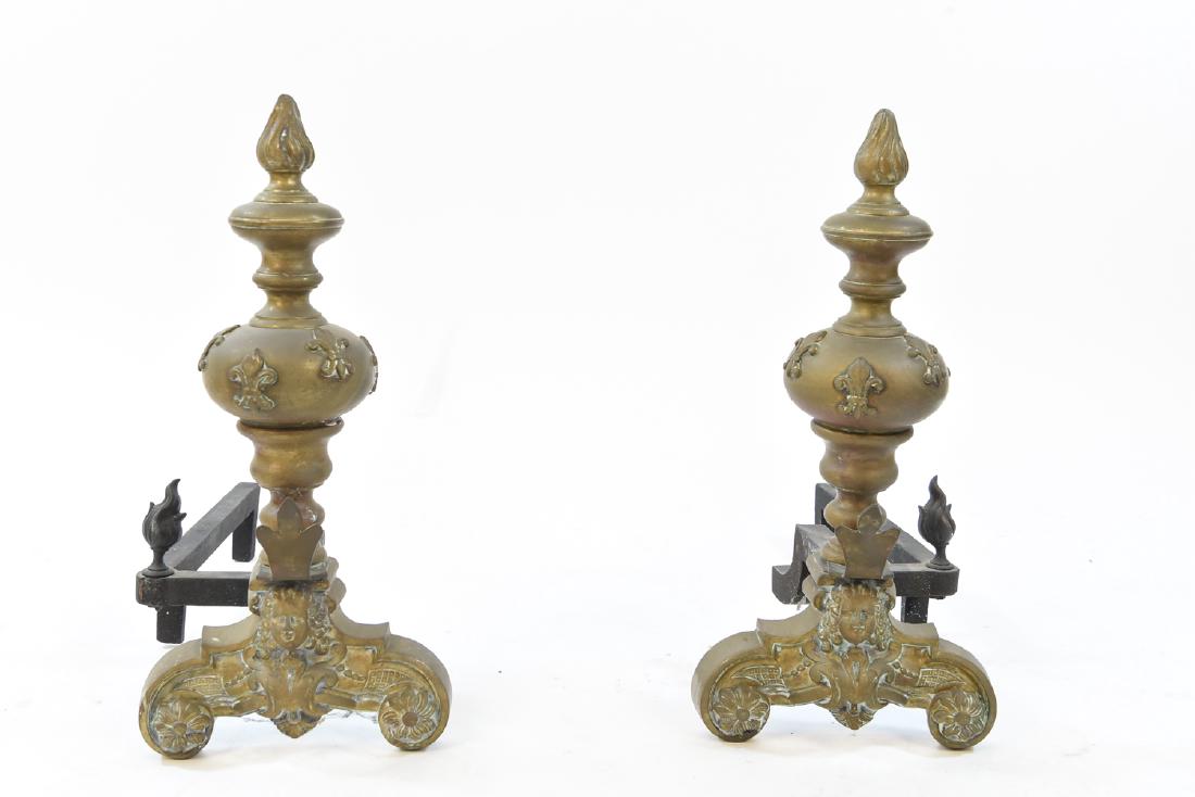 ORNATE BRASS ANDIRONS: Dimensions: H 18" x W 19.75" x D 8.5"Condition: Some wear consistent with use.