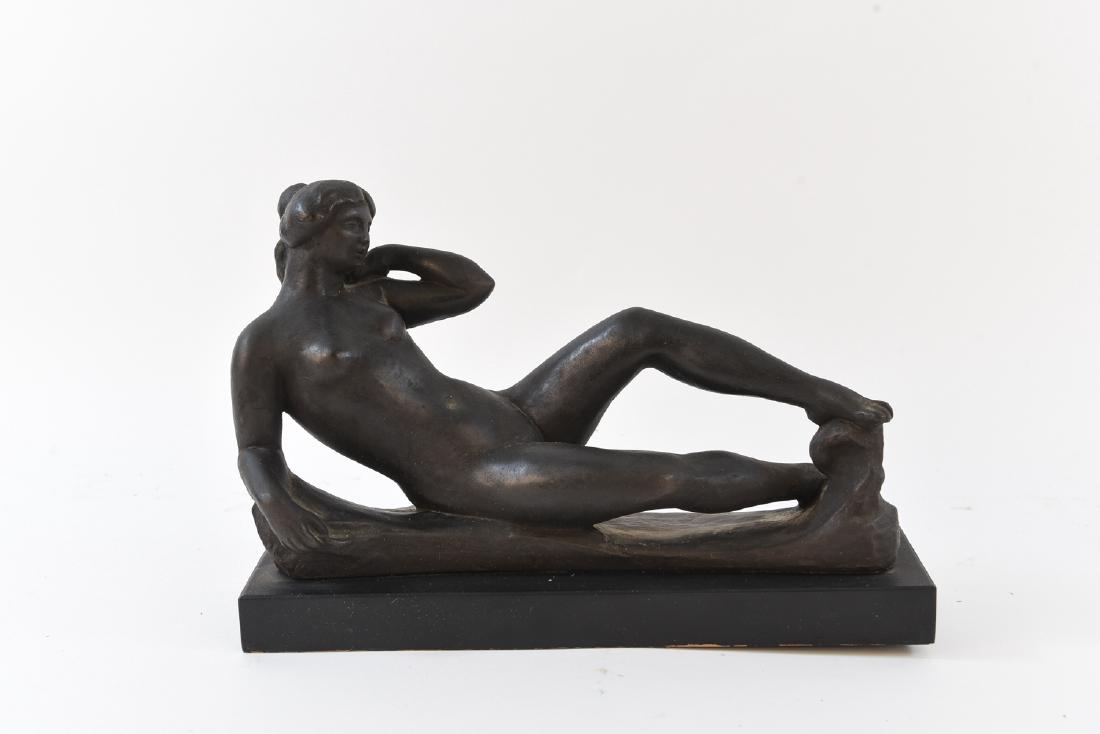 AFTER ANTONIO MAILLOL (FRECH 1861-1944): Reclining female Bonze patina composition on wood base. Dimensions: H 8.25" x W12.5" x D 3.5" Condition: No issues to note.