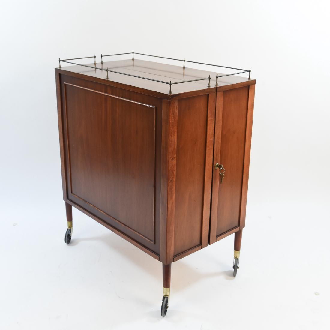 HENRY GLASS DESIGNED PORTABLE MAHOGANY CELLERETTE: Label in drawer, 2 keys. Dimensions: (Closed) H 36.5" x W 30" x D 18" Condition: Minor finish wear to outside.