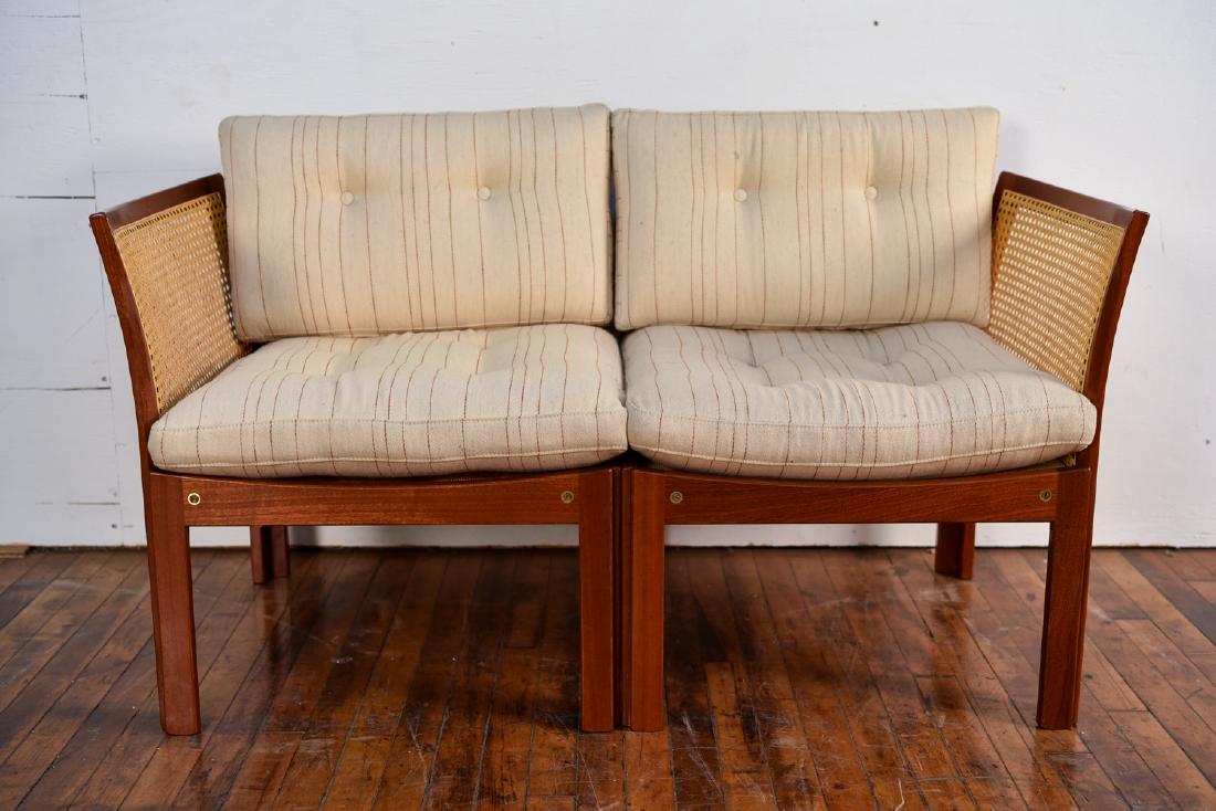 PLEXUS LOVESEAT IN MAHOGANY BY ILLUM WIKKELSO: Illum Wikkelso (1919-1999) for C.F. Christensen. Dimensions: H 25.5" x W 45.25" x D 23" Condition: Excellent overall condition, legs have minor separation as shown, does not take away from the piece. 