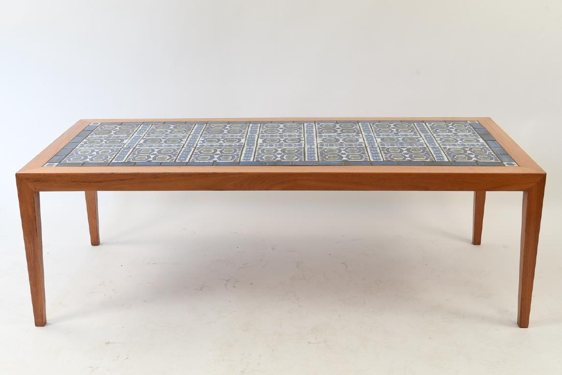 SEVERIN HANSEN JR. FOR HASLEV TEAK COFFEE TABLE: By Severin Hansen Jr. for Haslev with inlaid tiles designed by Grethe Hellan Hansen and manufactured by Royal Copenhagen. Dimensions: H 19.75" x W 60" x D 26.25" Condition: Tiles raised ever so slight