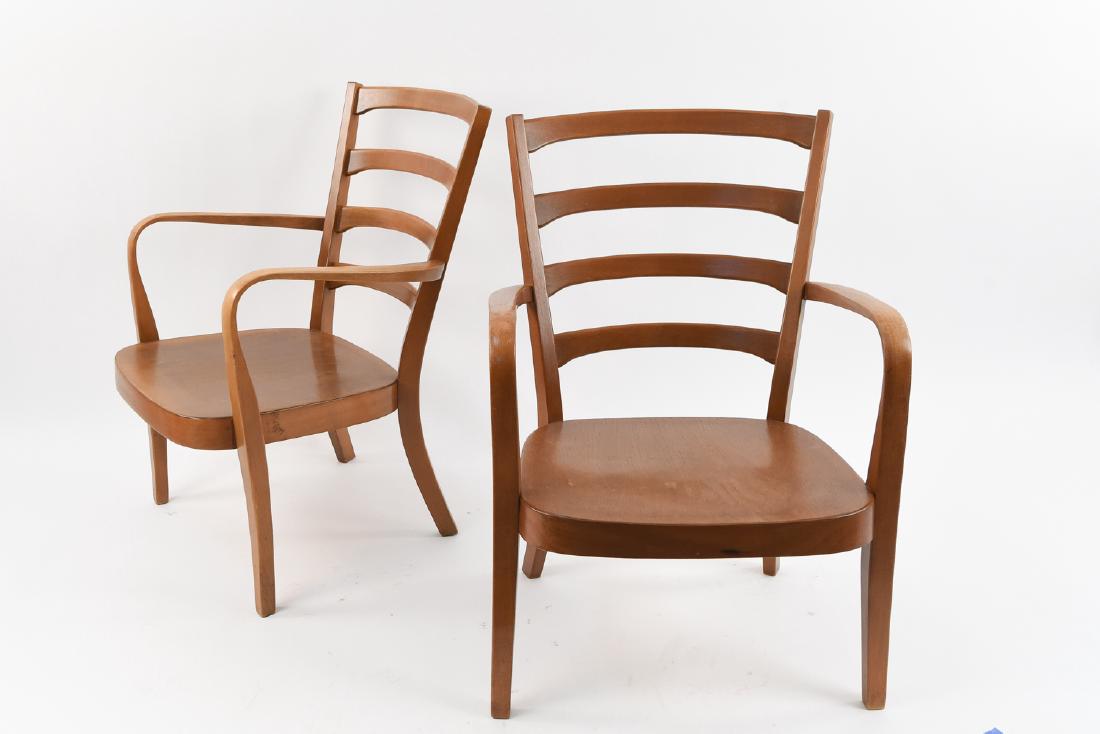 PAIR OF FRITZ HANSEN MID-CENTURY CHAIRS: 1940's, stained beech wood. Stamped under seat: FH Dimensions: H 31.75" x W 22.5" x D 23" Condition: Light wear consistent with use.