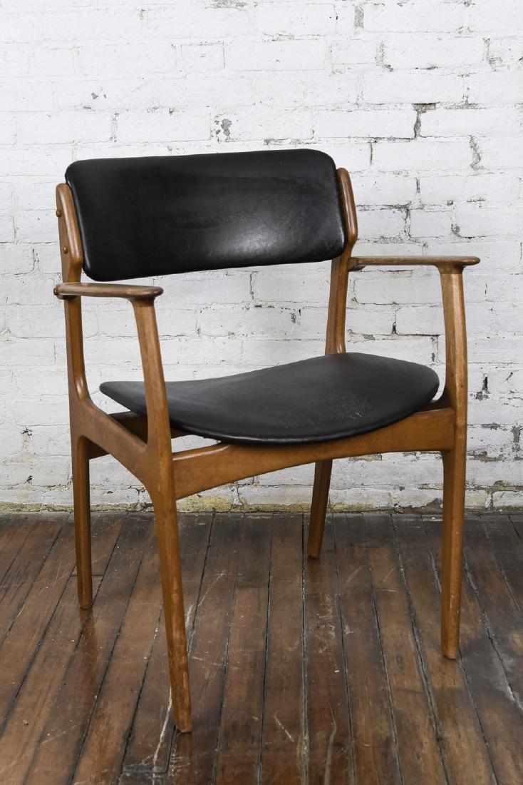 ERIK BUCH FOR ODDENSE MASKINSNEDKERI MODEL OD-49: Teak. Dimensions: H 31.5" x W 24" x D 21" x SH 17" Condition: Scratching to upholstery and marks to finish on the wood. Y025