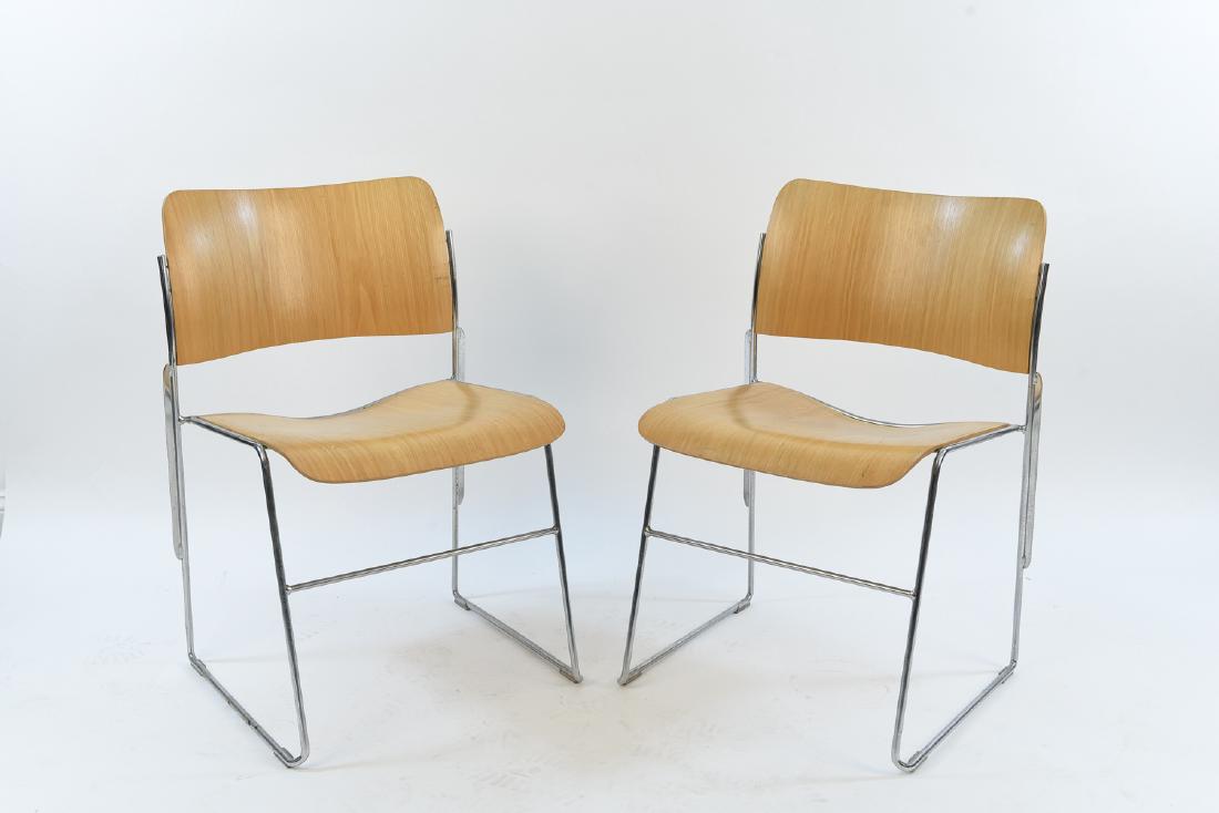 PAIR OF DAVID ROWLAND 40/4 CHAIRS: Tagged under seat: 40/4 Chair, designed by David Rowland. Dimensions: H 29" x W 18" x D 20" Condition: A few scratches and impressions, some heavy. Done wear to edges. Light early signs of pitting to
