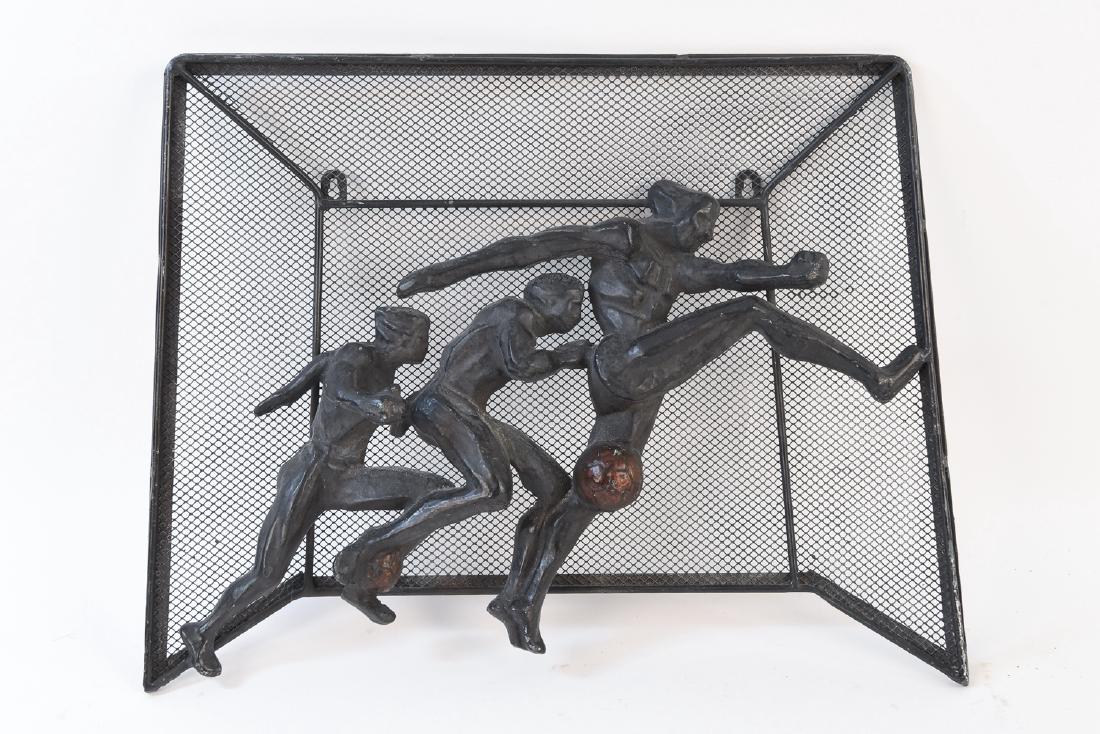 MID-CENTURY SOCCER METAL WALL SCULPTURE: Dimensions: H 15.5" x W 19.75" x D 3" Condition: Some paint loss.
