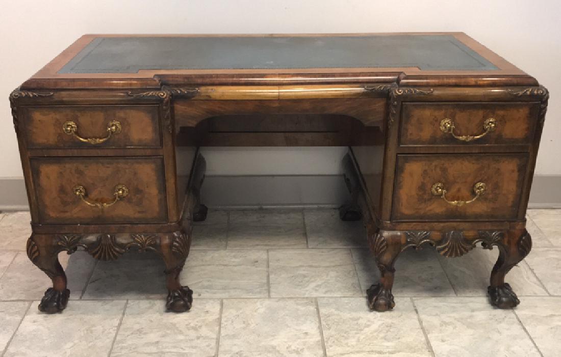 GEORGE III STYLE BURL WOOD DESK: Dimensions: H 29" x W 56.75" x D 26.25" Condition: Scuffs, gouges, and losses to leather top. Nicks, surface scratches, and dings to wood.