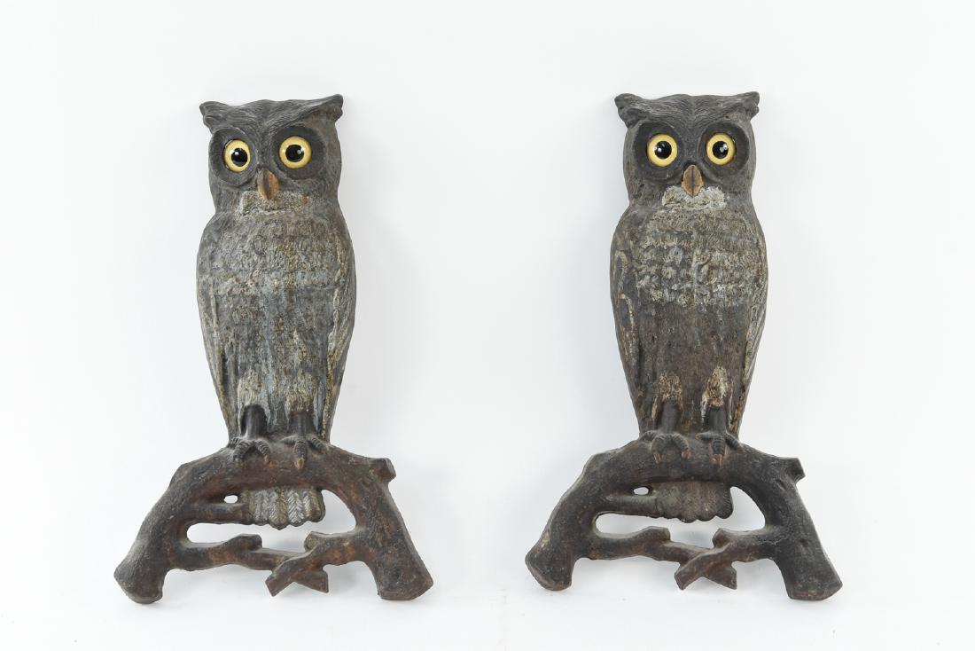 PAIR OF CAST IRON OWL ANDIRONS: Dimensions: H 15.75" x W 9.5" x D 1.75" Condition: Missing shanks. Showing signs of use.