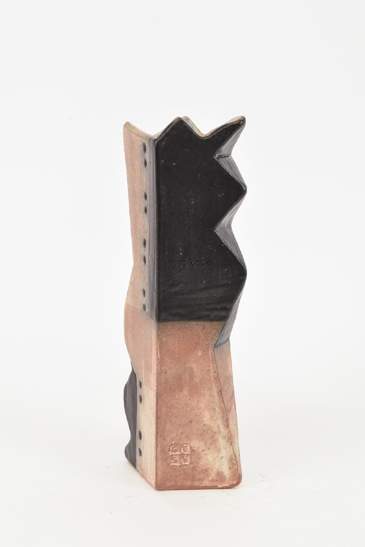 TERRY GESS CERAMIC VASE: Stamped on side: G E S S, glazed stoneware. Dimensions: H 8.75" x D 3.5" Condition: No issues to note.