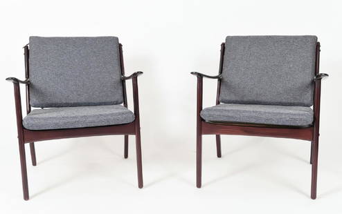 PAIR OF OLE WANSCHER MODEL PJ112 EASY CHAIRS: Model PJ 112, designed in 1951 and produced P. Jeppesen Møbelfabrik. Mahogany. Dimensions: H 29" x W 26" x D 27" x SH 16" Condition: New wool upholstery. WPA012