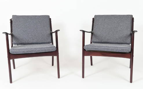 PAIR OF OLE WANSCHER MODEL PJ112 EASY CHAIRS: Model PJ 112, designed in 1951 and produced P. Jeppesen MÃ¸belfabrik. Mahogany. Dimensions: H 29" x W 26" x D 27" x SH 16" Condition: New wool upholstery. WPA012