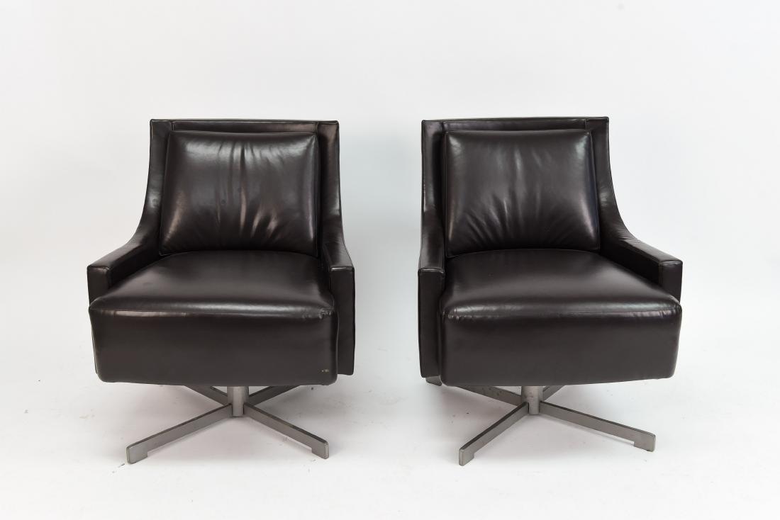 PAIR OF HBF LEATHER SWIVEL LOUNGE CHAIRS: Dark brown. Dimensions: H 29" x W 25.5" x D 25" Condition: No issues to note