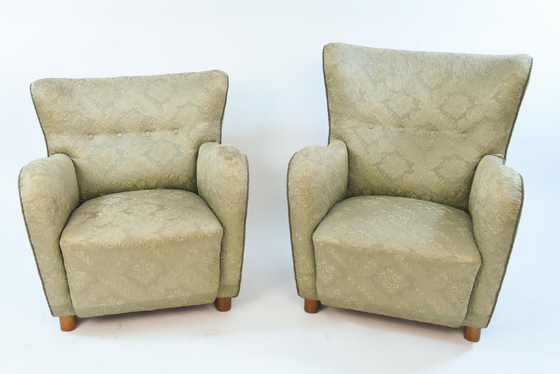 PAIR OF FRITZ HANSEN DANISH EASY CHAIRS: "His & Her's" Fritz Hansen Danish Midcentury Easy Chairs. Dimensions: H 36" x W 30" x D 36" x SH 15" Condition: Wear consistent with age and use. WPB243