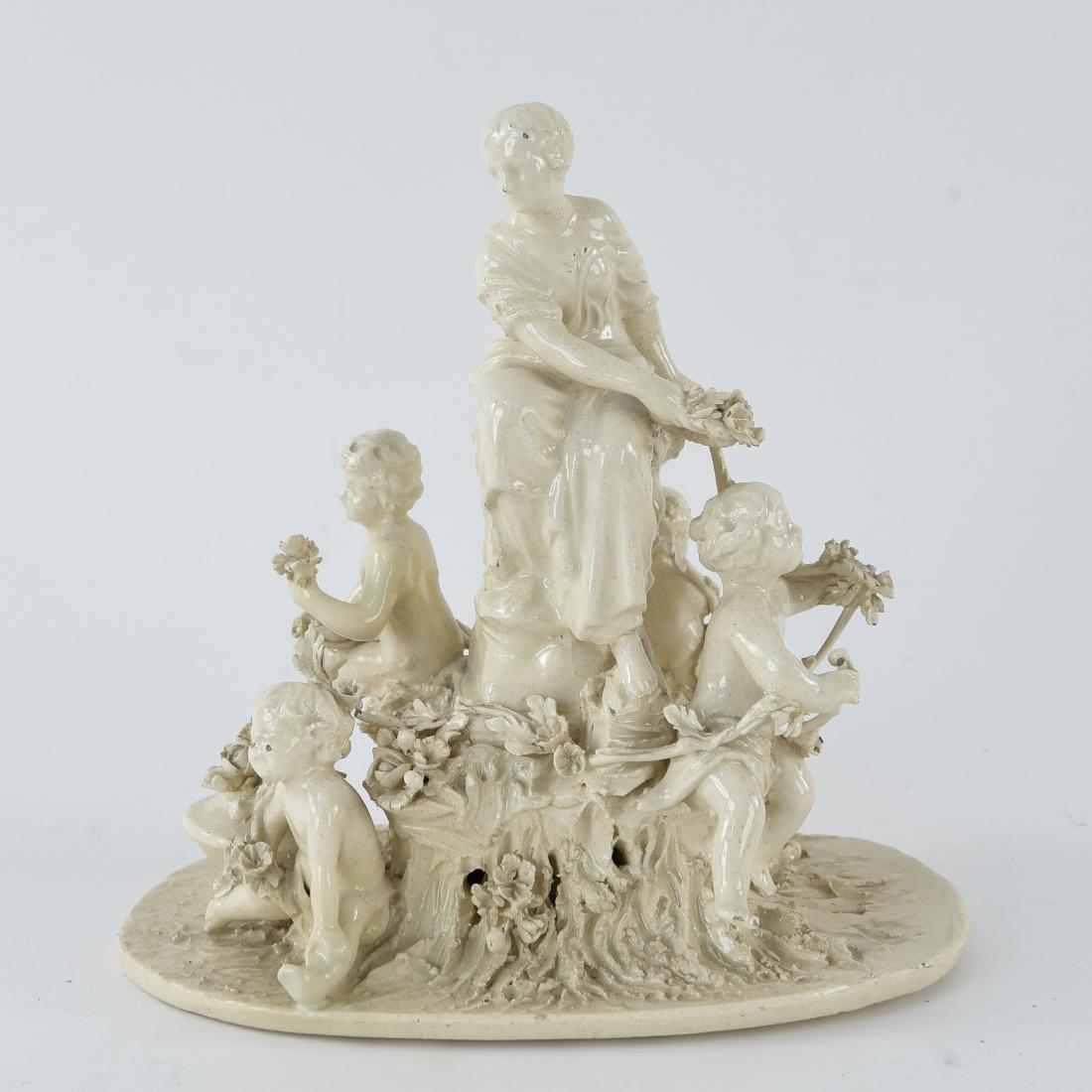 PORCELAIN FIGURAL GROUP: With Roman number II marking underneath. Dimensions: H 7.75" x W 7.5" x D 4.5" Condition: Few small chips to glaze. Few small hairline cracks. Few small losses to tips.
