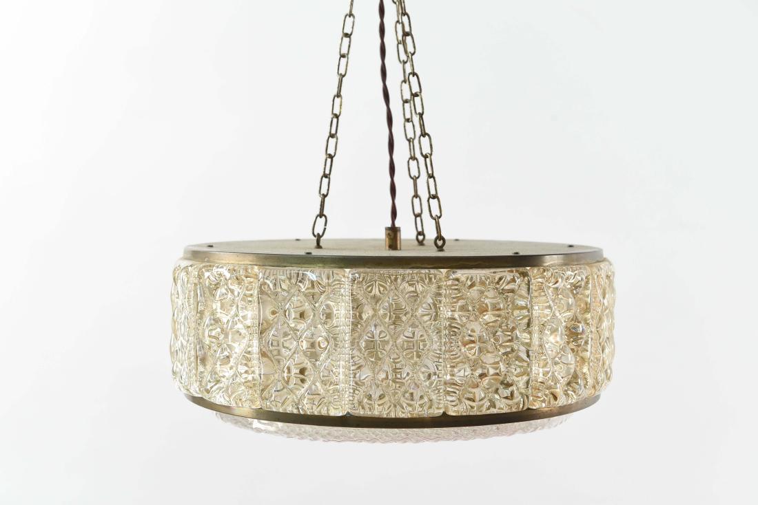 CRYSTAL AND BRASS CHANDELIER BY ORREFORS: Dimensions: H 6" x Dia. 14" Condition: Discolored on brass. Minor scratches.