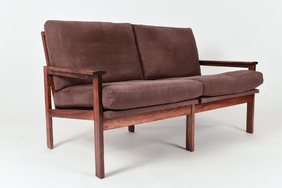 PAIR OF ILLUM WIKKELSO NIELS EILERSEN SOFAS: Model Capella. Danish, mid-century. Rosewood finish. Dimensions: H 29" x W 51" x D 29" x SH 16" Condition: Wear consistent with age and use. WPA059