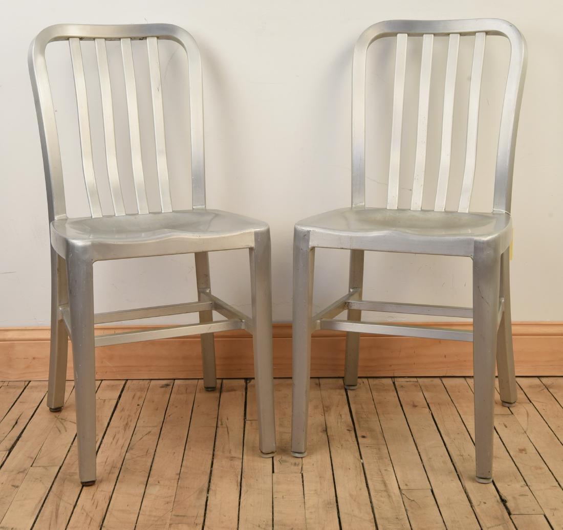(2) ALUMINUM NAVY DECK CHAIRS: Dimensions: H 33.25" x W 15.25" x D 17.25" Condition: Some scratches, scuffs, and spots. Wear consistent with age and use.