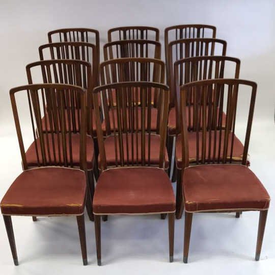 (12) GEORG KOFOED DANISH ROSEWOOD DINING CHAIRS: c. 1930's. Dimensions: H 37.5" x W 18" x D 18.5" x SH 18" Condition: Scuffing and scratches to the surface of the frames, seat cushions need new upholstery. Wear consistent with age and use. Minor fad