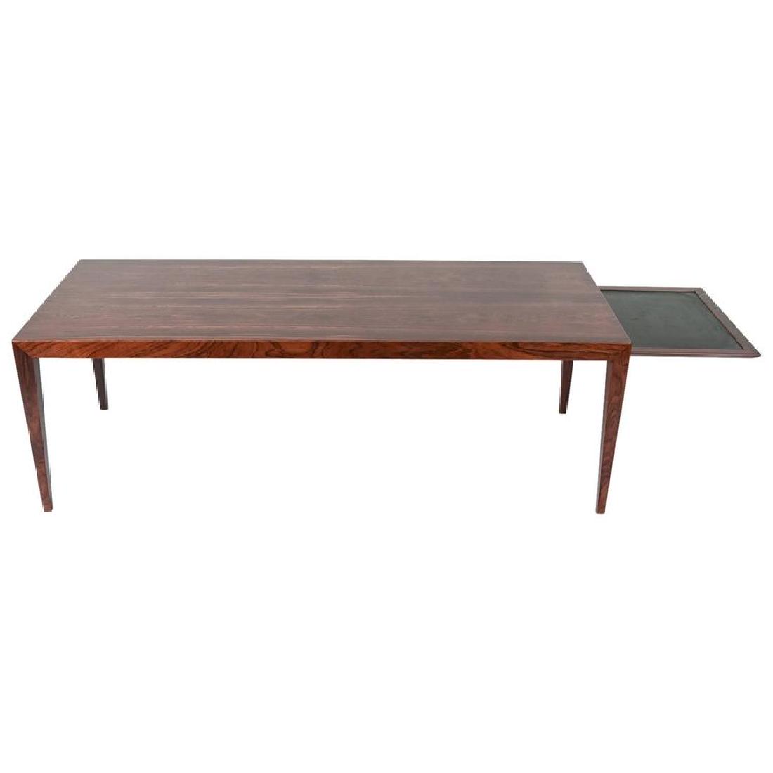 SEVERIN HANSEN FOR HASLEV EXTENDABLE COFFEE TABLE: Rosewood. Dimensions: H 20" x W 59" x D 23.5" Condition: Wear consistent with age and use. WPA040