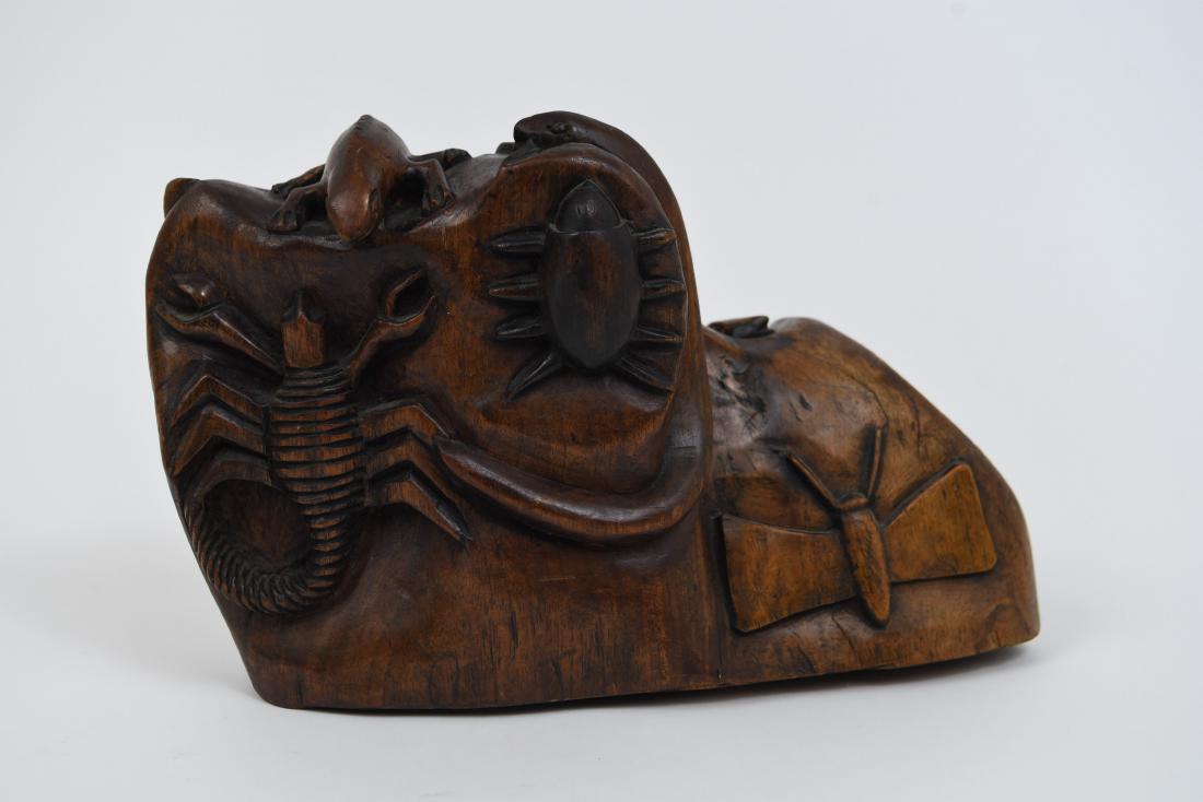 FOLK ART WOODEN CARVING WITH INSECTS: Dimension: 8.5"H x 13.5"W x 7.5" D Condition: Carved beetles, snakes, scorpion, lizards carved in wood. no major scratches suffs or loss of woord