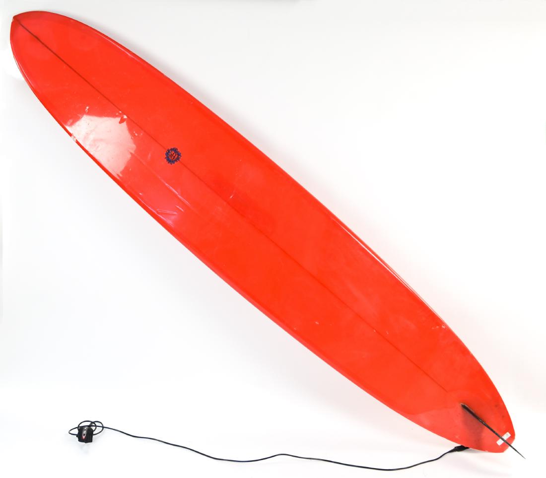 DICK BREWER SURFBOARD: Dimensions: L 127" x W 22" x D 11"Condition: Used. Scuffs and wear. Some damage from use.