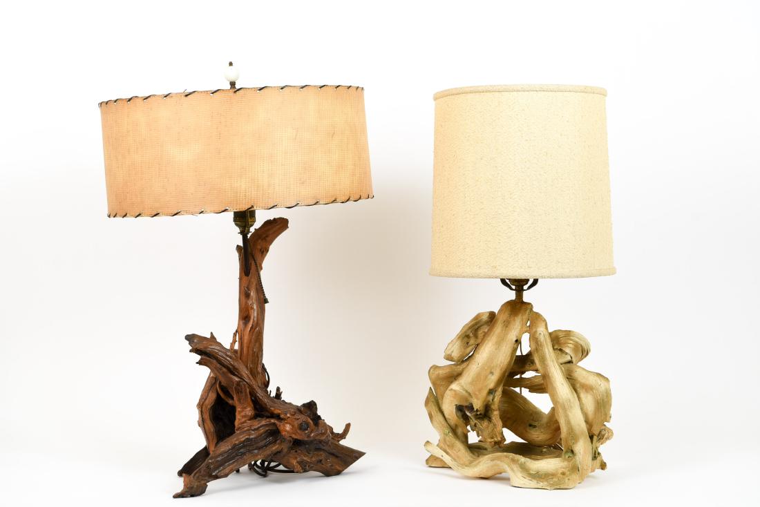 (2) VINTAGE DRIFTWOOD LAMPS: One faux, one with lacquered surface. Dimensions: (Taller incl. shade) H 27" x Dia. 17.25" Condition: Not tested. Harps bent. Shades age toned.