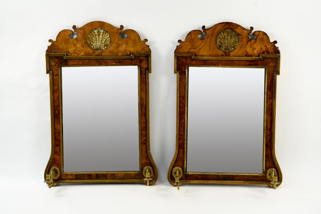 PAIR ANTIQUE MIRRORS WITH CANDLE HOLDERS: Chippendale style. Dimensions: H 40.25" x W 28" x D 8 Condition: Antique wear throughout consistent with age including some old repairs and losses. Some loss of silver to mirror. Tarnish to candle hol