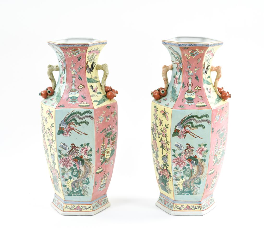 PAIR OF 20TH C. CHINESE PORCELAIN URNS: With red Chinese character mark underneath. Dimensions: H 25" x Dia. 11.5" Condition: Some areas of crazing. Few minor chips. Couple small losses to glaze.