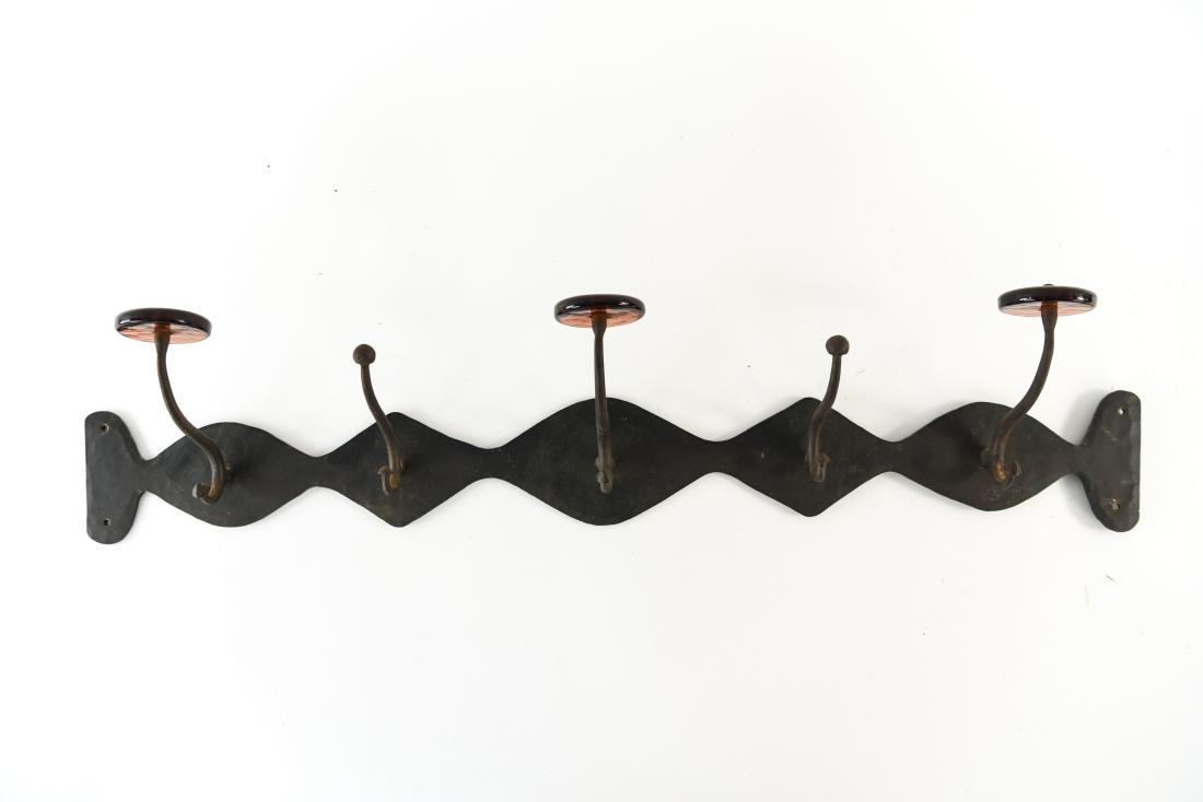 MID-CENTURY SCANDINAVIAN IRON AND GLASS COAT RACK: Dimensions: H 6" x W 31.75" x D 5" Condition: No issues to note.