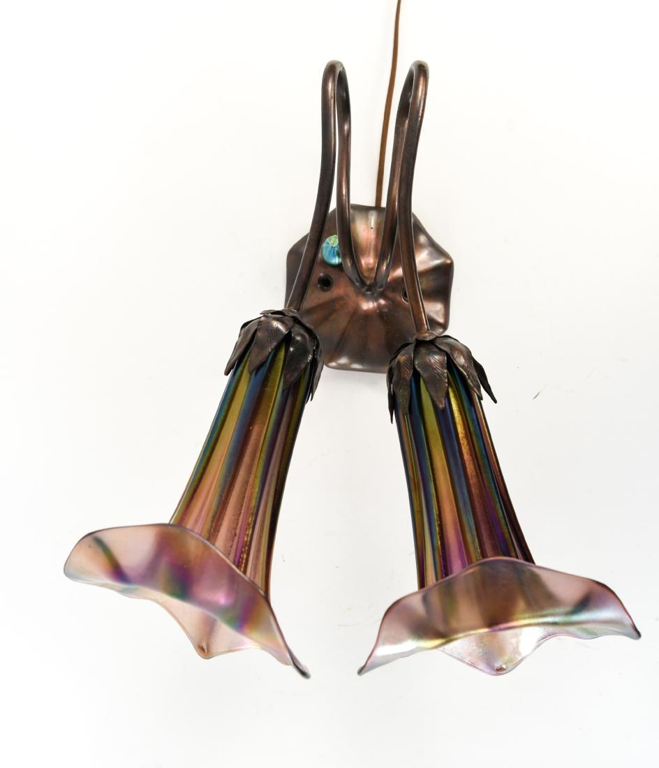 1991 COOK ART GLASS IRIDESCENT DOUBLE SHADE SCONCE: John Cook, shade signed and dated 1991. Includes original hardware. Dimensions: H 16.75" x W 13.75" x D 9.25" Condition: Not tested.