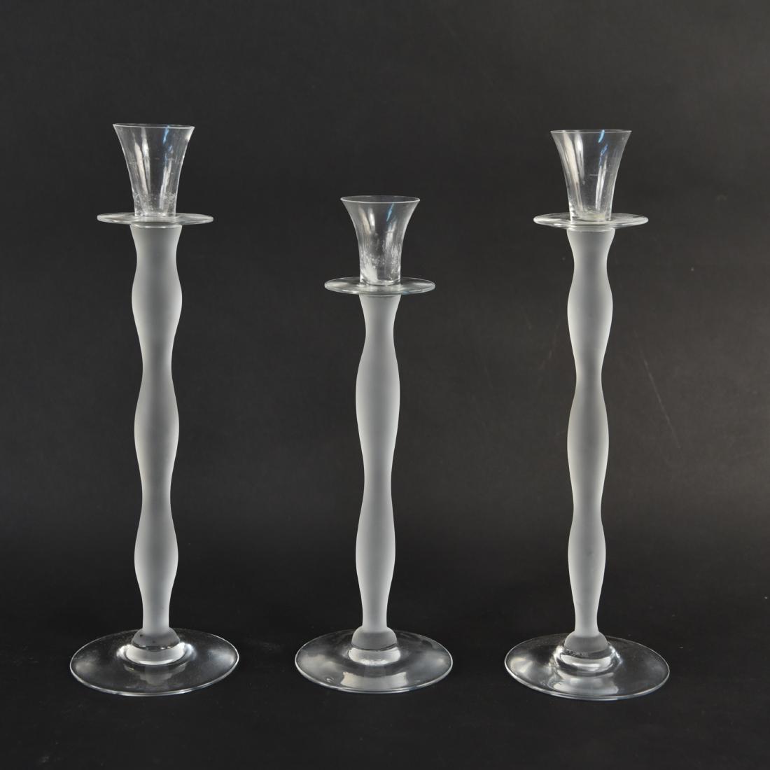(3) ORREFORS CANDLE STICKS: Marked under base: Orrefors Sweden. Dimensions: H 14.5" x D 4.5" Condition: Showing light signs of use.