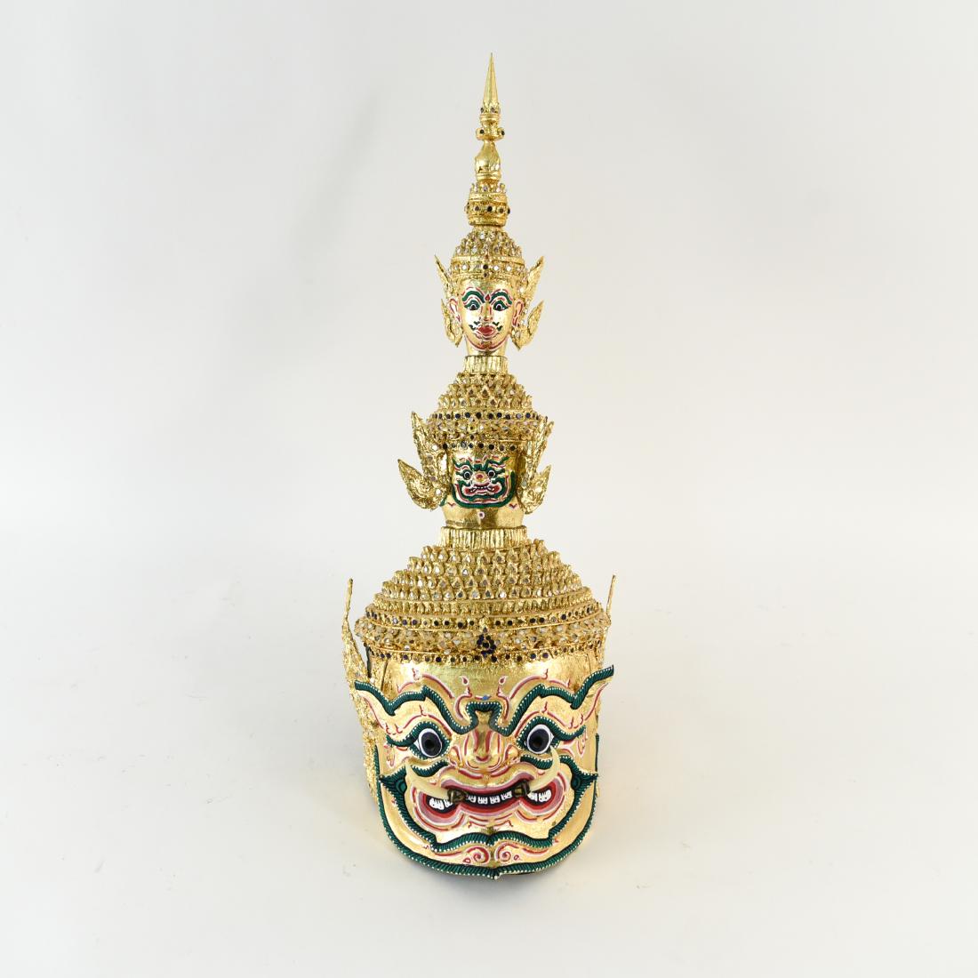 GOLD GILT THAI MASK FIGURE: Dimensions: H 22" x W 9" x D 12" Condition: Break to one ear.