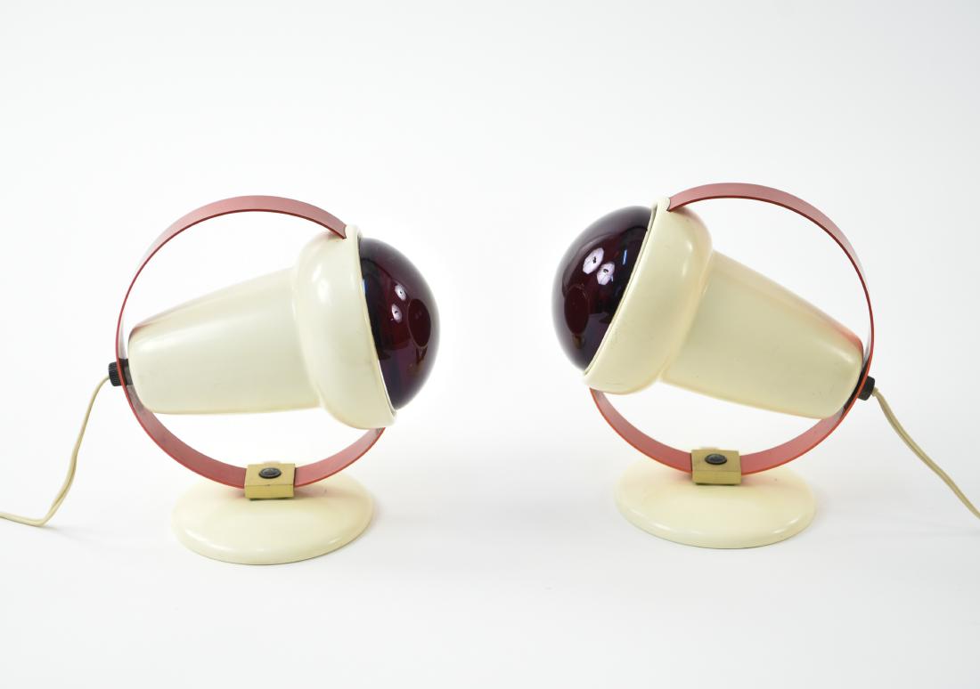 (2) CHARLOTTE PERRIAND FOR PHILIPS INFRAPHIL LAMPS: Designed 1952. Enameled metal and aluminum. Dimensions: H 9.5" x W 6.5" x D 10" Condition: Some minor scratching to the finish here and there. Wear consistent with age and use.