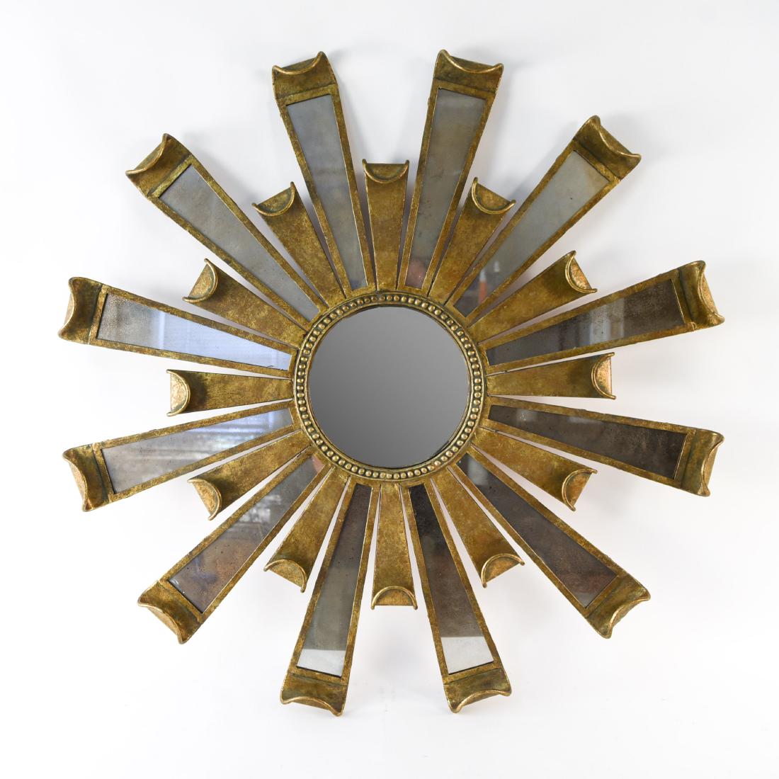 SUNBURST MIRROR: Dimensions: Dia. 42.75" Condition: Patina and surface wear. Some foxing to mirror.