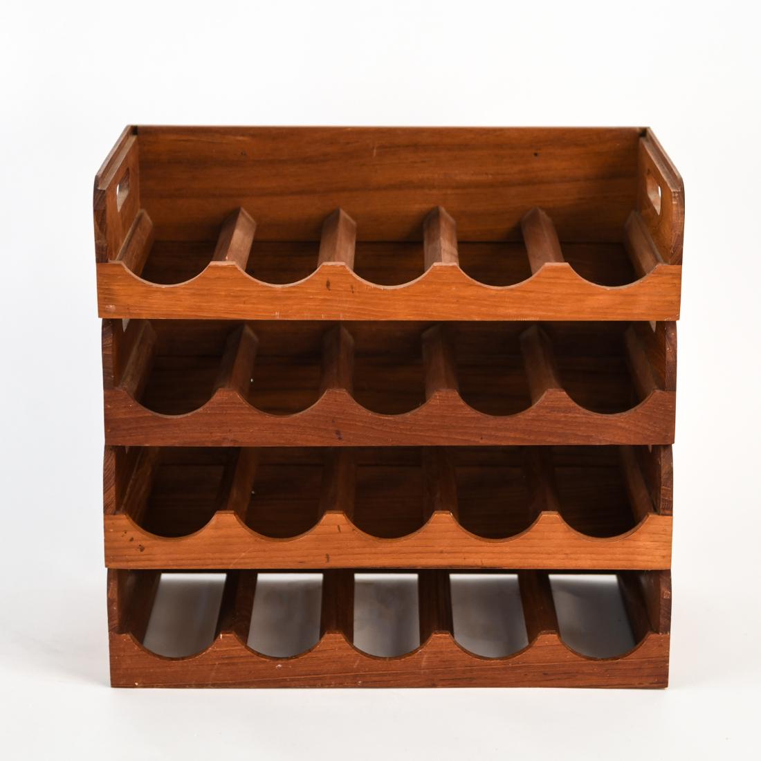 KALMAR MODULAR TEAK WINE RACK SHELVES: (4) stacking teak wood shelves. Sticker on back: Kalmar Designs, teak wood, made in Thailand. Dimensions: (Each shelf) H 4.25" x W 19" x D 10.75" Condition: Finish wear. Few nicks and dings. Do not si