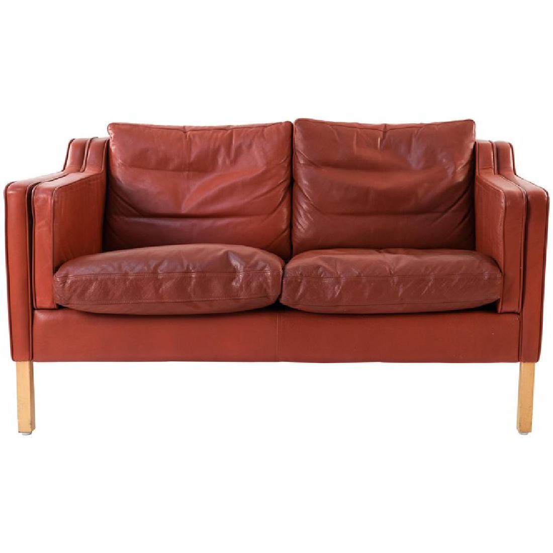 BORGE MOGENSEN STYLE STOUBY RED LEATHER LOVESEAT: Red leather. Danish, mid-century. Dimensions: H 29" x W 55.5"x D 32", SH 18" Condition: Light scuffs to edges. Signs of use. Wear consistent with age and use. WPC001-A