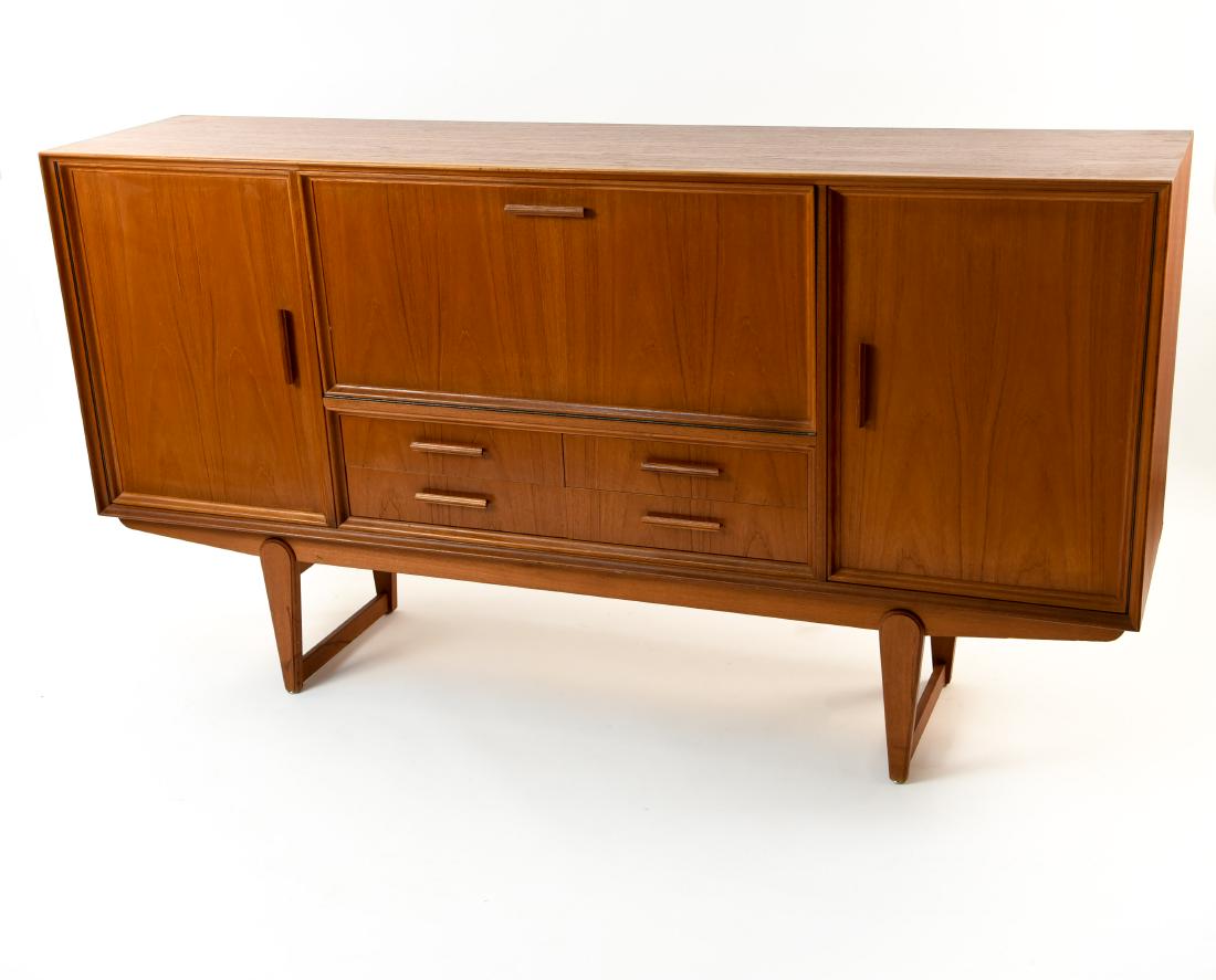 DANISH MID-CENTURY TEAK SIDEBOARD: Dimensions: H 42.25" x W 78.75" x D 18" Condition: Some chipping to veneer around edges. Scratches and scuffs. Finish wear. Wear consistent with age and use. Minor losses. WPC068
