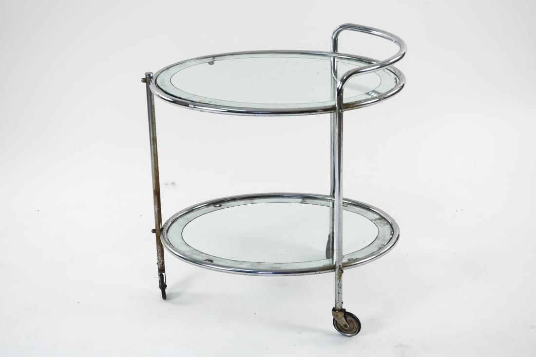 CHROME BAR CART: Dimensions: H 29" x W 27" x D 18.5" Condition: Some loss to mirror silvering. Pitting and rust to chrome. Few chips to glass.