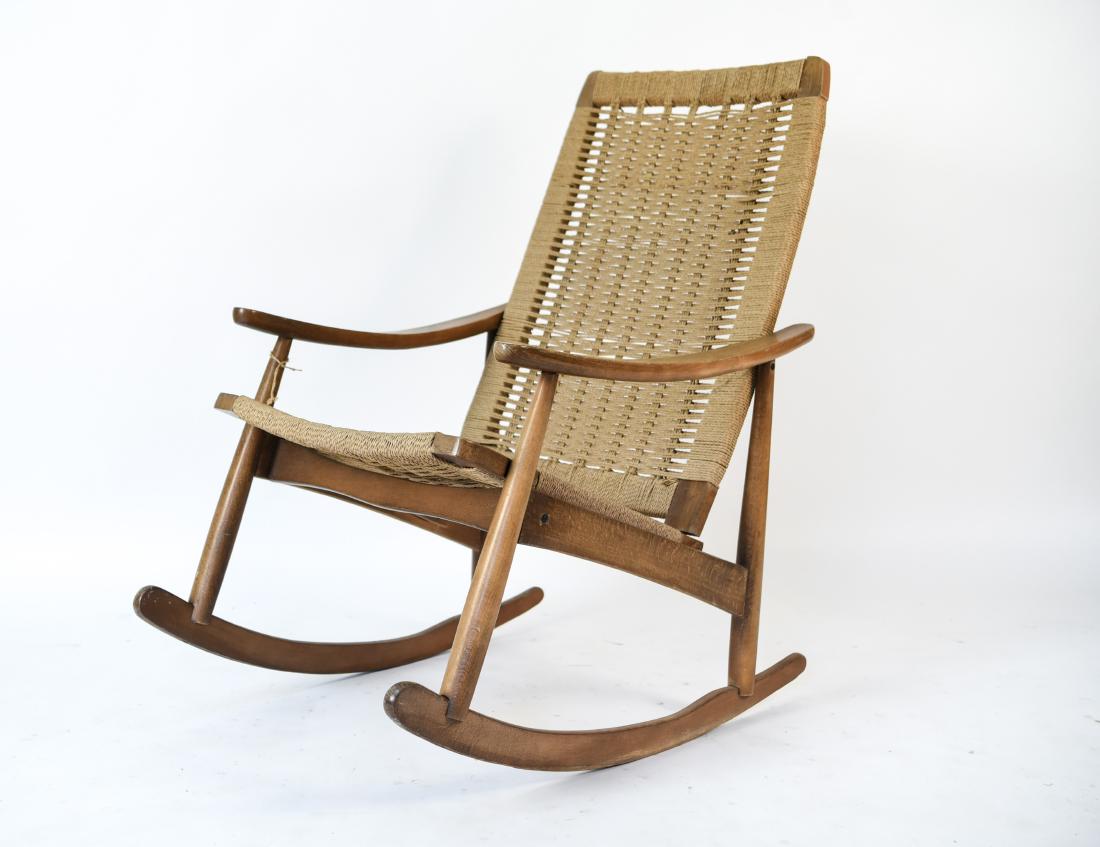 1960’S YUGOSLAVIAN ROPE ROCKING CHAIR: Dimensions: H 37.25" x W 24" x D 32.5", SH 19" Condition: Some finish wear to wood. Scratches and scuffs. Wear consistent with age and use.