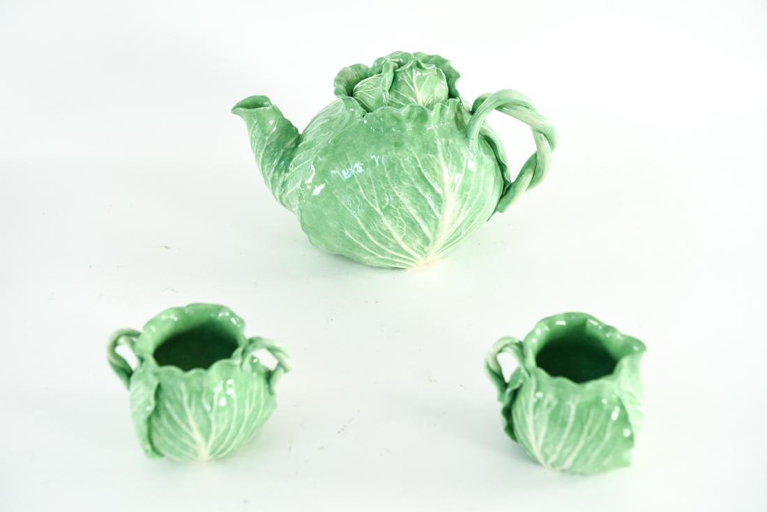 DODIE THAYER LETTUCE WARE TEAPOT, SUGAR, & CREAMER: Teapot, creamer, and sugar. Marked underneath. Dimensions: (Teapot) H 6" x W 10" x D 6.5" Condition: No issues to note.