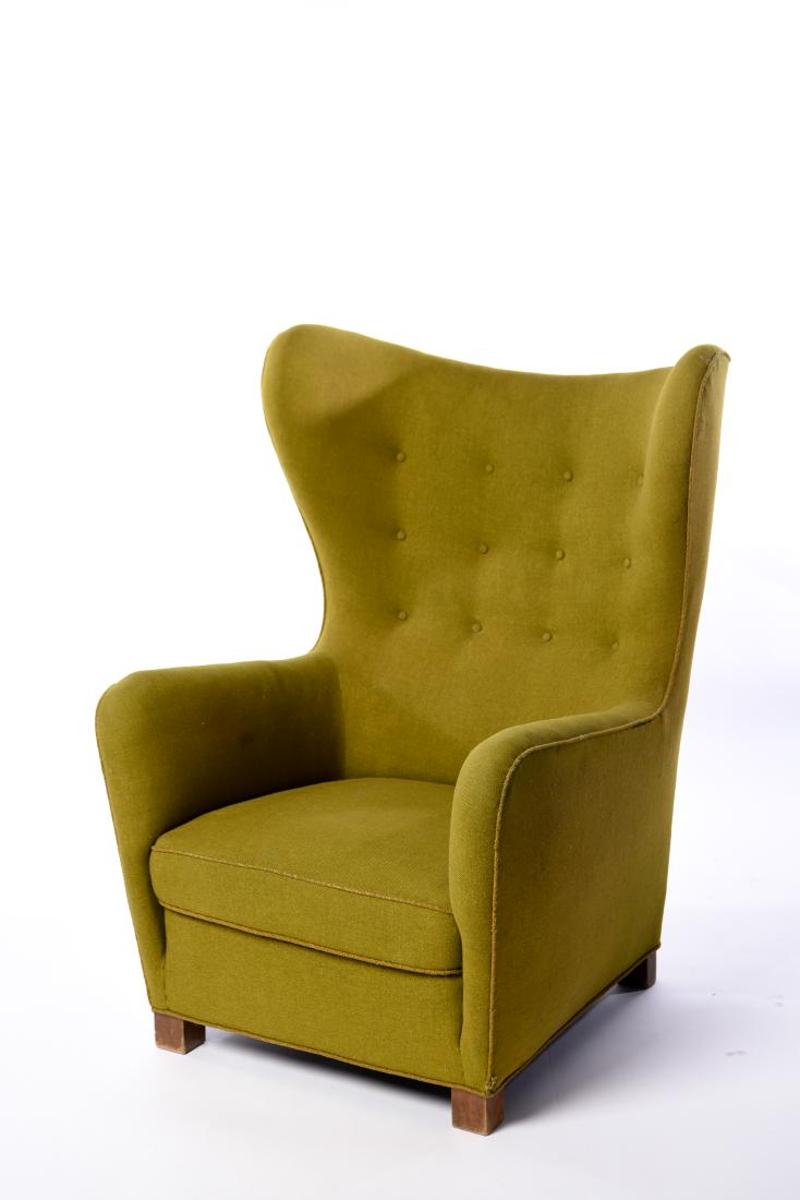 1942 FRITZ HANSEN MODEL 1672 WING BACK CHAIR: In original green wool fabric. Dimensions: H 43" x W 32" x D 34" x SH 14.5" Condition: Original upholstery with soiling and fading, may need to be reupholstered. Wear consistent with age and use. Mino
