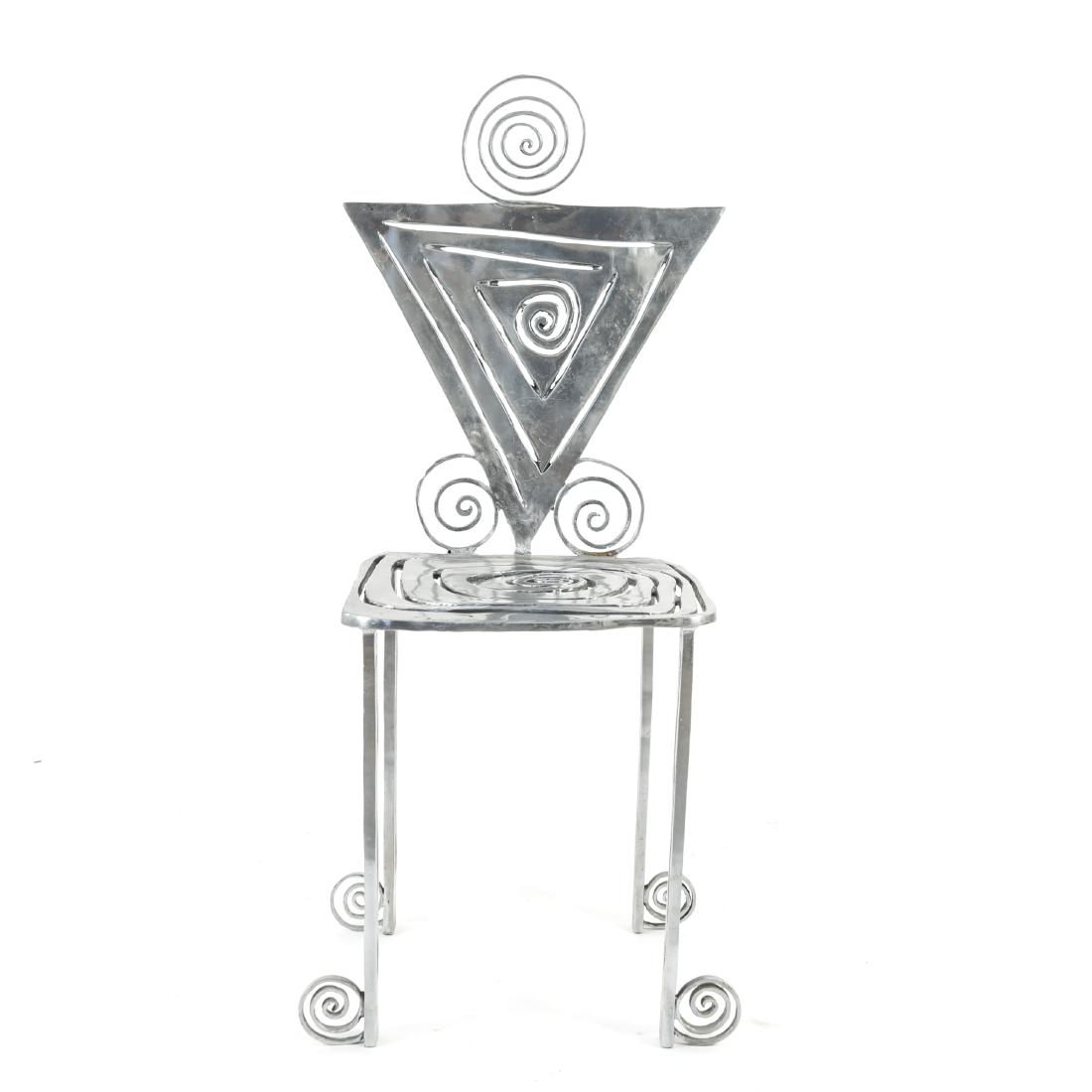 TOBY HELLER SCULPTURAL SIDE CHAIR: Dimensions: H 40.5" x W 17.75" x D 14.25", SH 18" Condition: Surface scratches and marks.