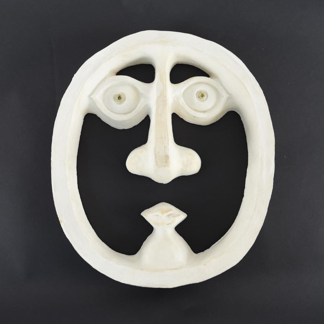 DAVID GIL FOR BENNINGTON POTTERY SURREALIST FACE: Fully marked on back. Dimensions: H 14" x W 12" x D 3" Condition: Staining. Few small chips.