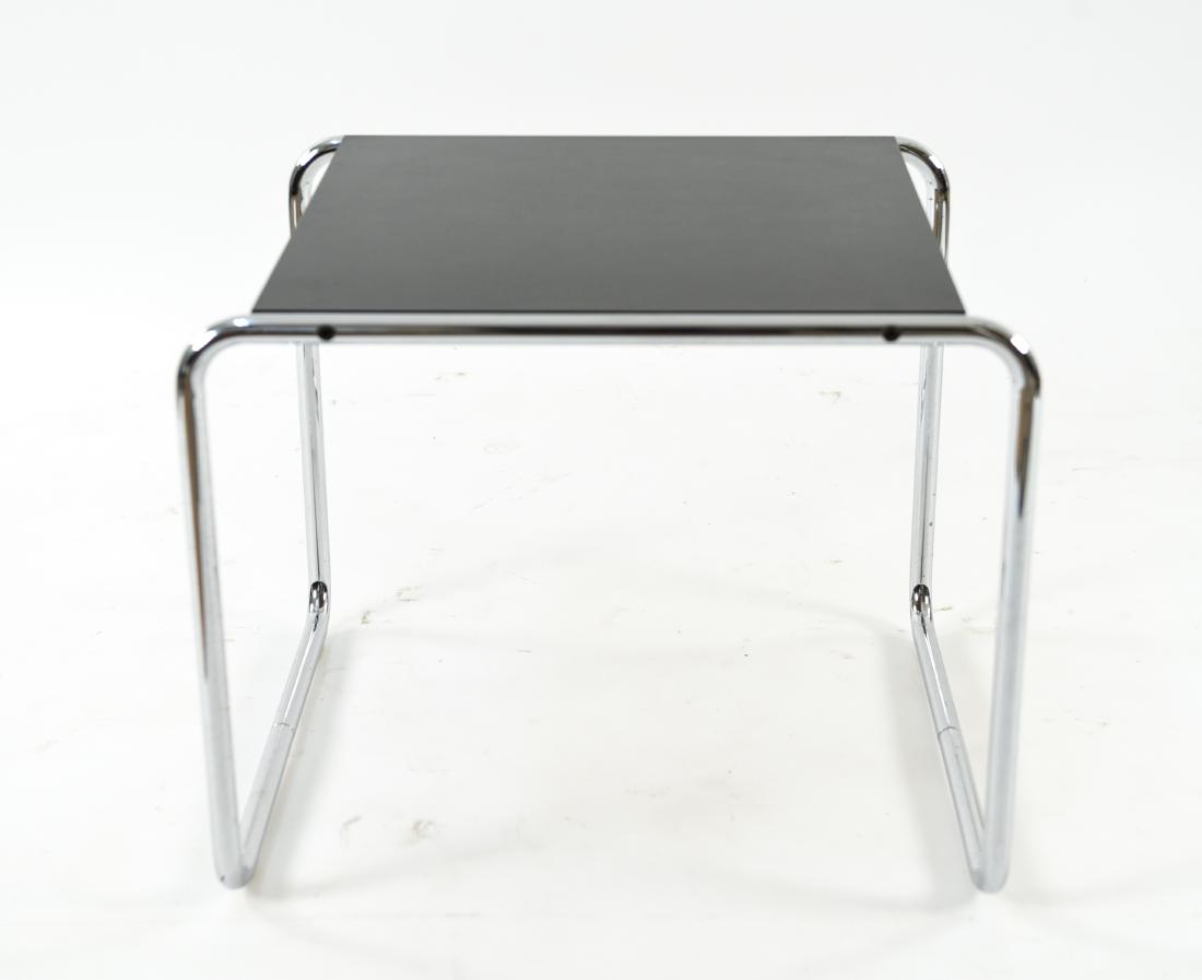 MANNER OF MARCEL BREUER SIDE TABLE: Dimensions: H 17.75" x W 21.75" x D 18.75" Condition: Some light surface scratches.